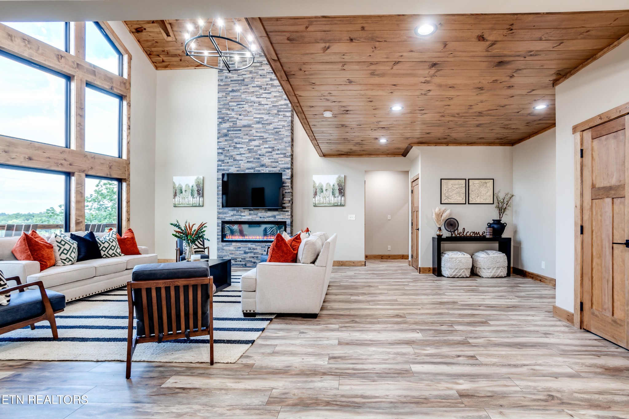 1820 High View Court Sevierville, TN 37876 - Photo 6 of 58 a living room with furniture and a flat screen tv