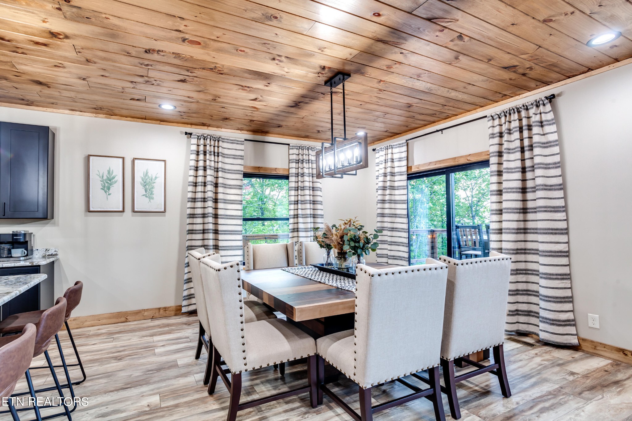 1820 High View Court Sevierville, TN 37876 - Photo 10 of 58 a dining room with furniture a chandelier and wooden floor