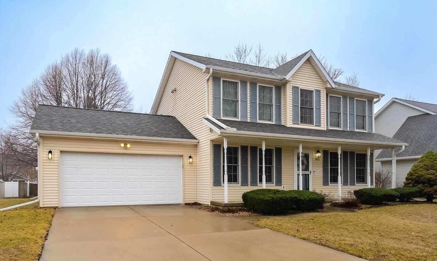 811 Landau Lane Normal, IL 61761 - Photo 1 of 34 a front view of a house with garden