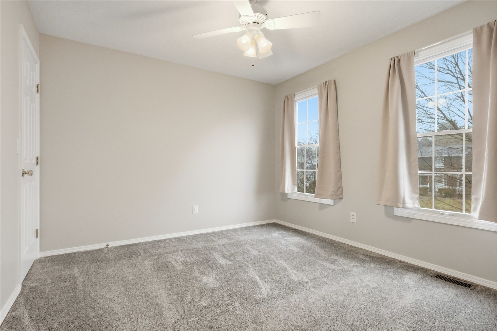 811 Landau Lane Normal, IL 61761 - Photo 12 of 34 an empty room with a window