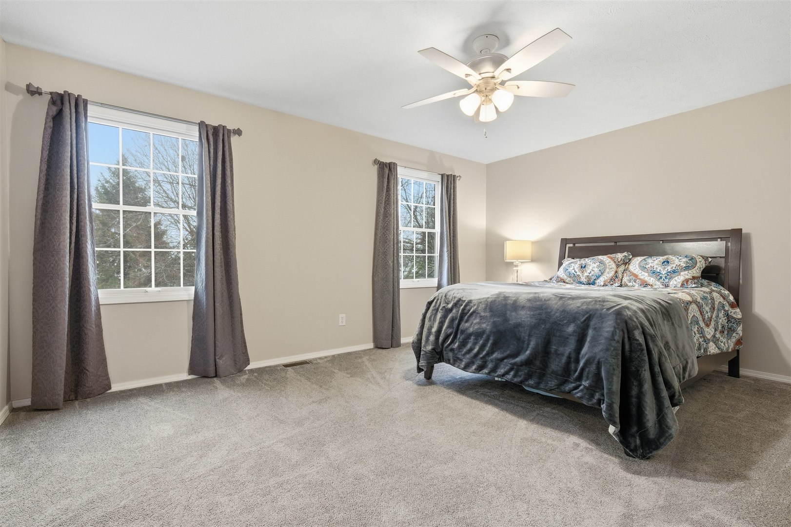 811 Landau Lane Normal, IL 61761 - Photo 15 of 34 a bedroom with a bed and window