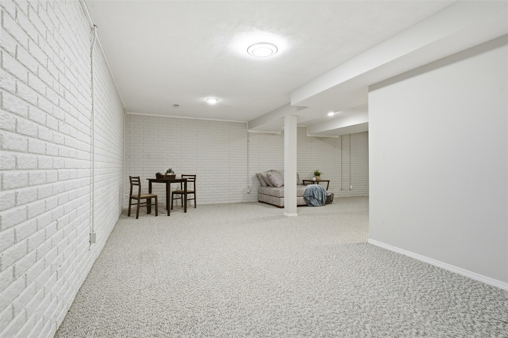 811 Landau Lane Normal, IL 61761 - Photo 19 of 34 a view of a livingroom with furniture and a ceiling fan