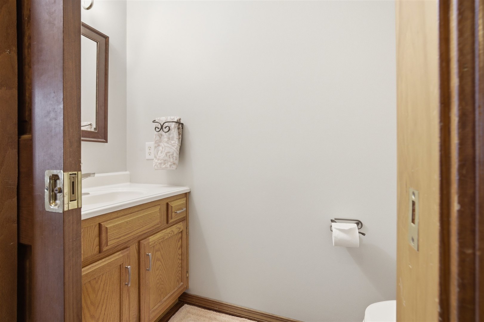 811 Landau Lane Normal, IL 61761 - Photo 9 of 34 a bathroom with a sink and a mirror