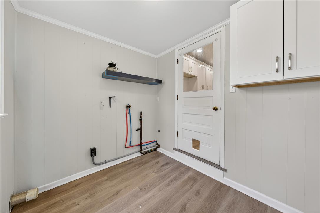 65 2nd Street Slatington, PA 18080 - Photo 22 of 46 This functional laundry room provides ample space for utility hookups, featuring clean walls and durable flooring.