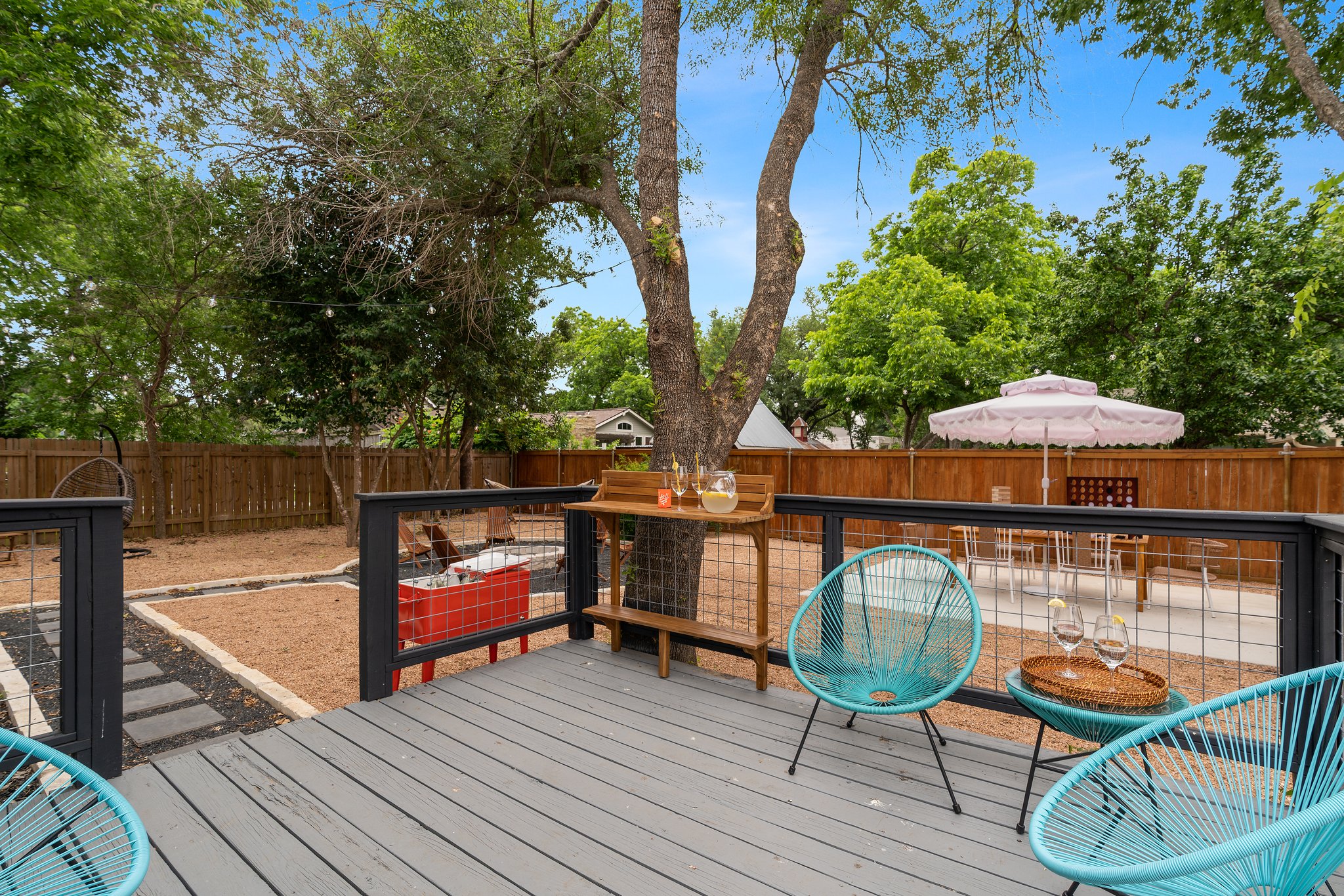 1204 East 13th Street Georgetown, TX 78626 - Photo 23 of 26 a view of deck with seating space and trees