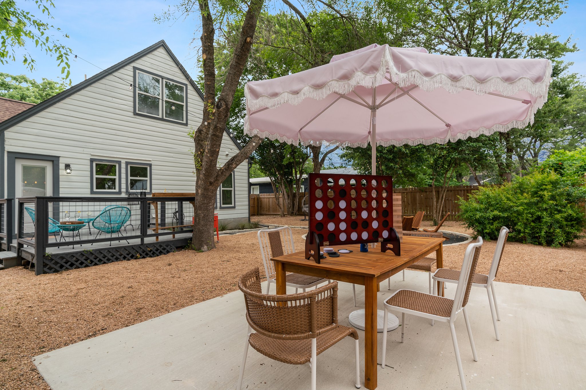 1204 East 13th Street Georgetown, TX 78626 - Photo 24 of 26 a view of a chair and table in the backyard