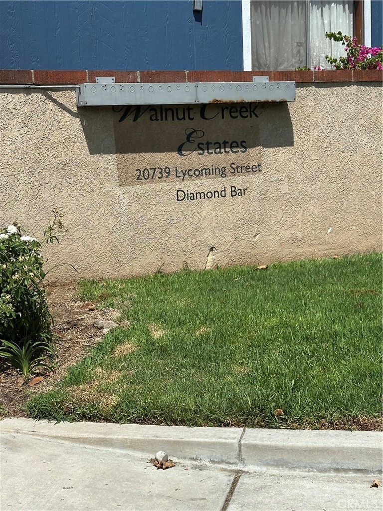 20739 Lycoming Street Walnut, CA 91789 - Photo 2 of 3 a front view of a house with a yard