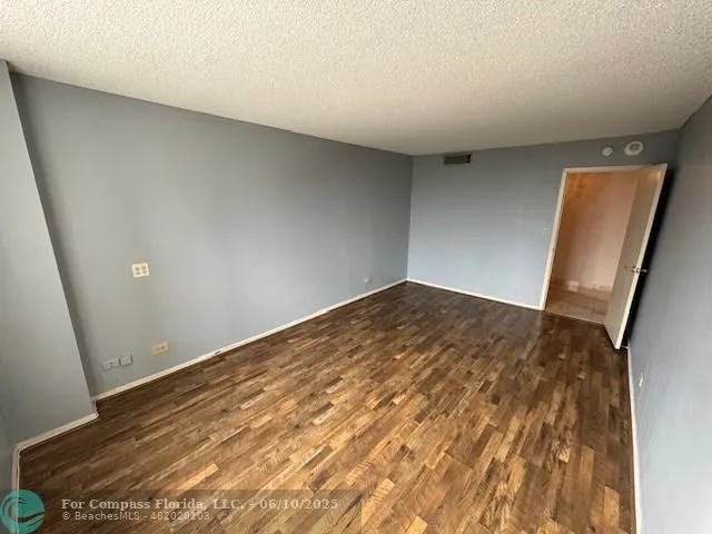 a bathroom with a sink toilet and a mirror