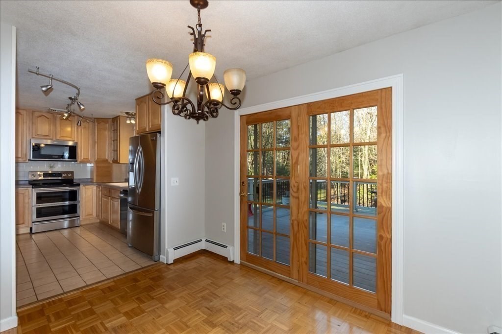 15 Wilbraham Road Hampden, MA 01036 - Photo 22 of 38 a view of a kitchen with a sink and stainless steel appliances