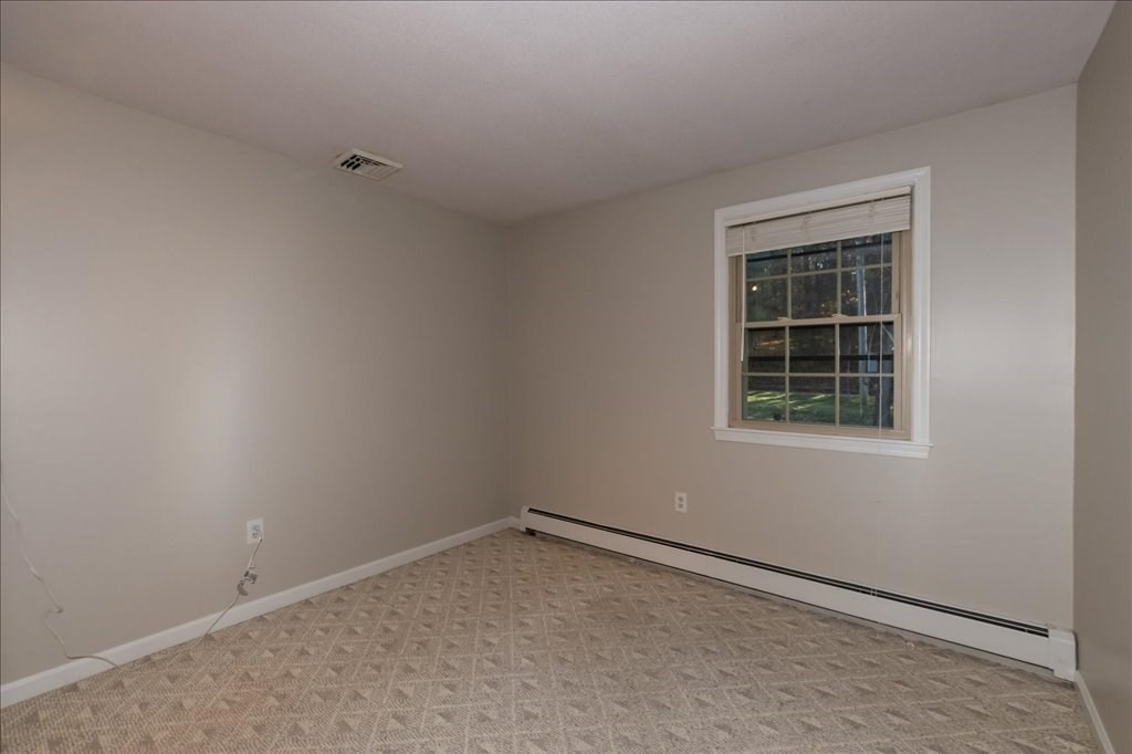 15 Wilbraham Road Hampden, MA 01036 - Photo 34 of 38 an empty room with a window