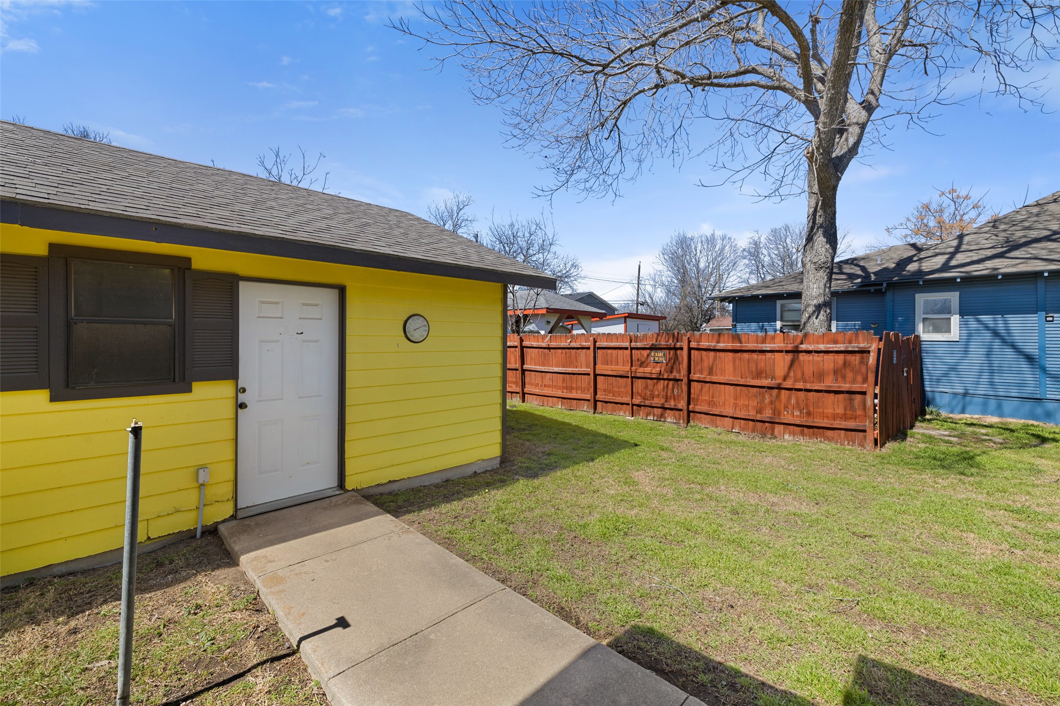 303 Vernon Street Taylor, TX 76574 - Photo 11 of 37 View of yard with fence