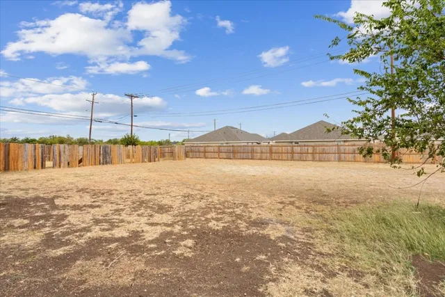 a view of a city with an ocean view