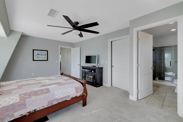 a view of a patio with a table chairs and a patio