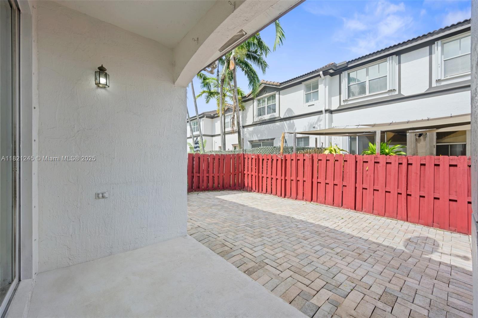 7633 Northwest 114th Path, Unit 7633 Doral, FL 33178 - Photo 22 of 25 a view of a large brick building
