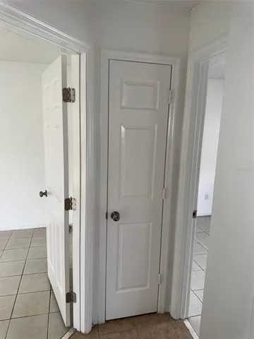 a view of a closet area with window