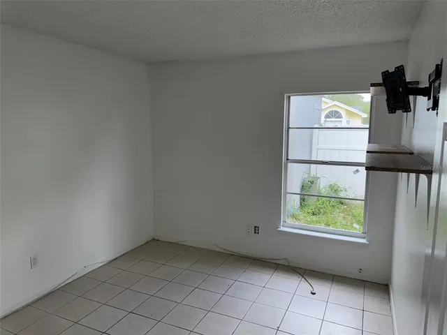 a view of empty room with window