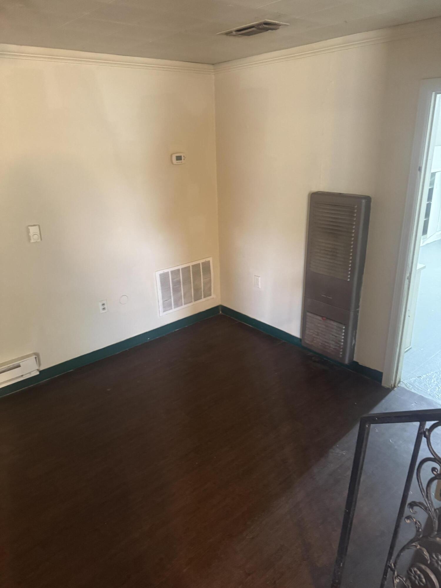 2612 36th Street Lubbock, TX 79413 - Photo 21 of 30 an empty room with a door