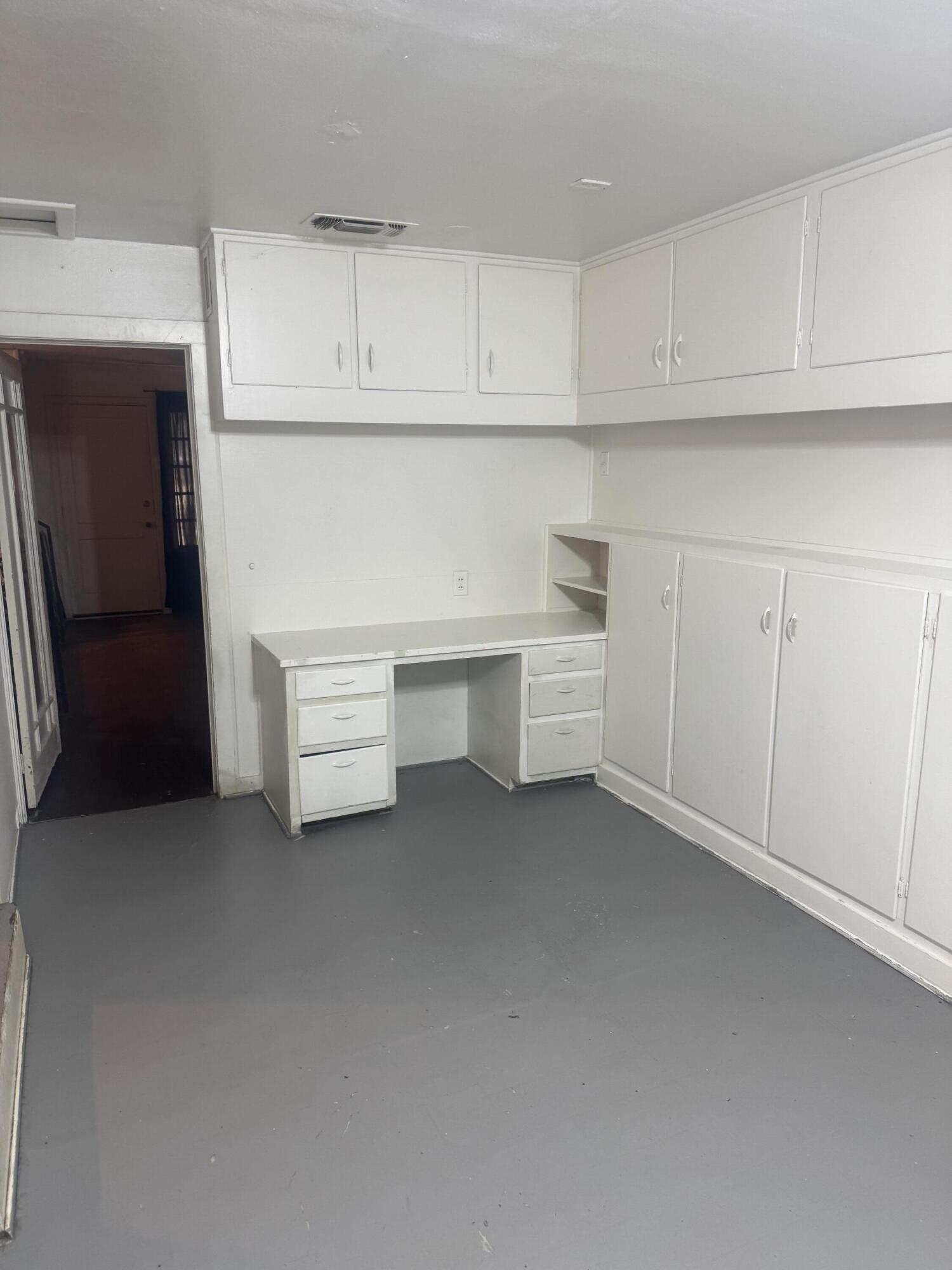 2612 36th Street Lubbock, TX 79413 - Photo 23 of 30 a view of cabinets and wooden cabinets