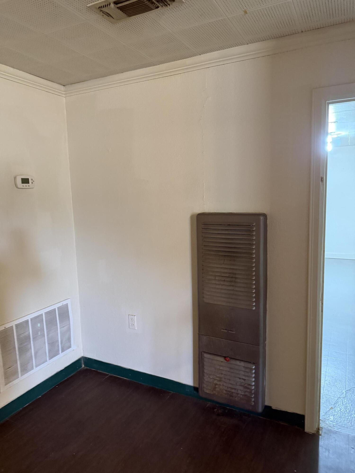 2612 36th Street Lubbock, TX 79413 - Photo 5 of 30 an empty room with wooden floor
