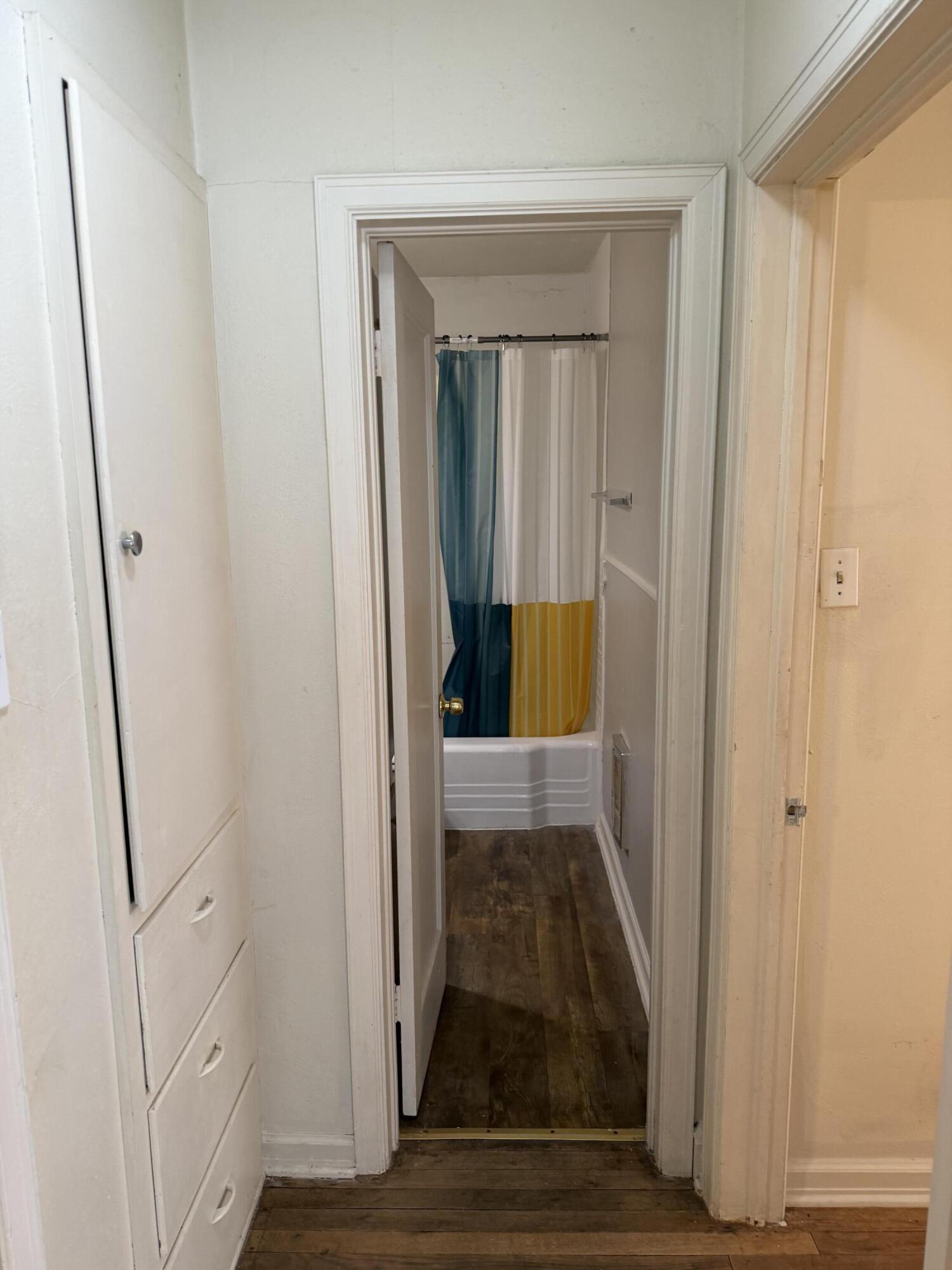 2612 36th Street Lubbock, TX 79413 - Photo 9 of 30 a view of a bathroom from a hallway