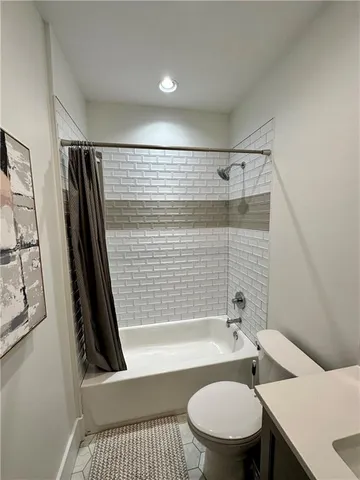 a bedroom with bed and window