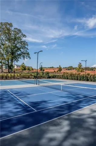 a front view of building with white umbrellas