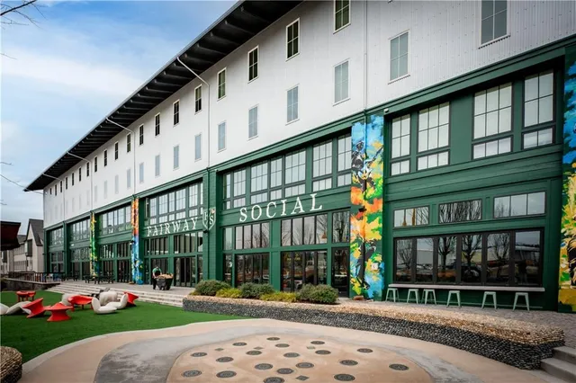 a view of a building with sitting area