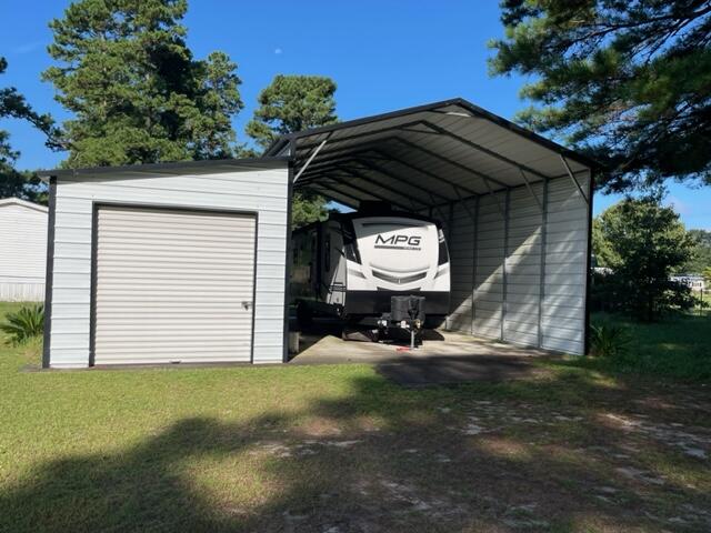 349 Stumphole Road Elloree, SC 29047 - Photo 20 of 22 Garage Storage