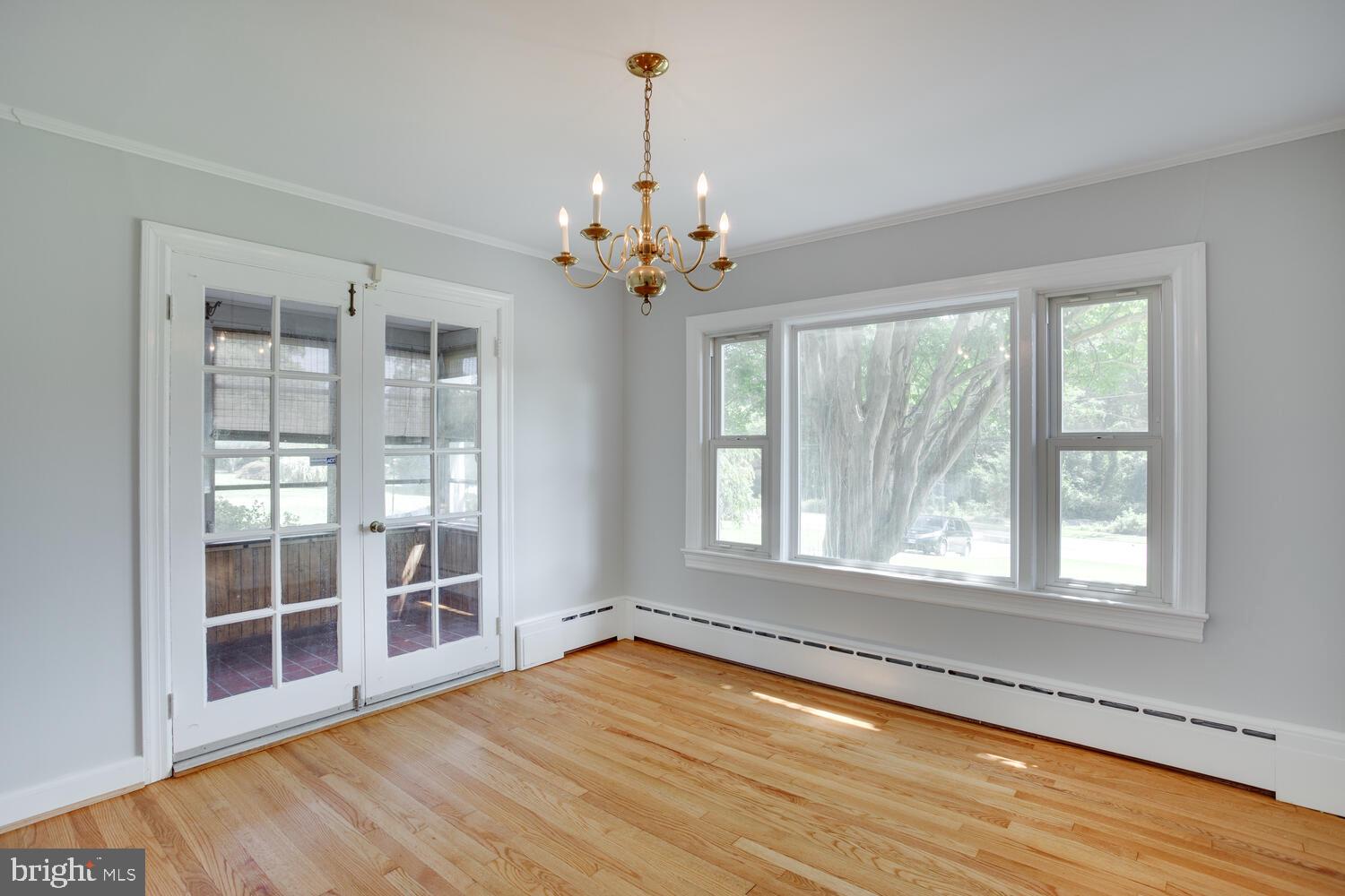 2510 Plum Point Road Huntingtown, MD 20639 - Photo 11 of 62 Dining Room w/ French doors to Sun Porch.