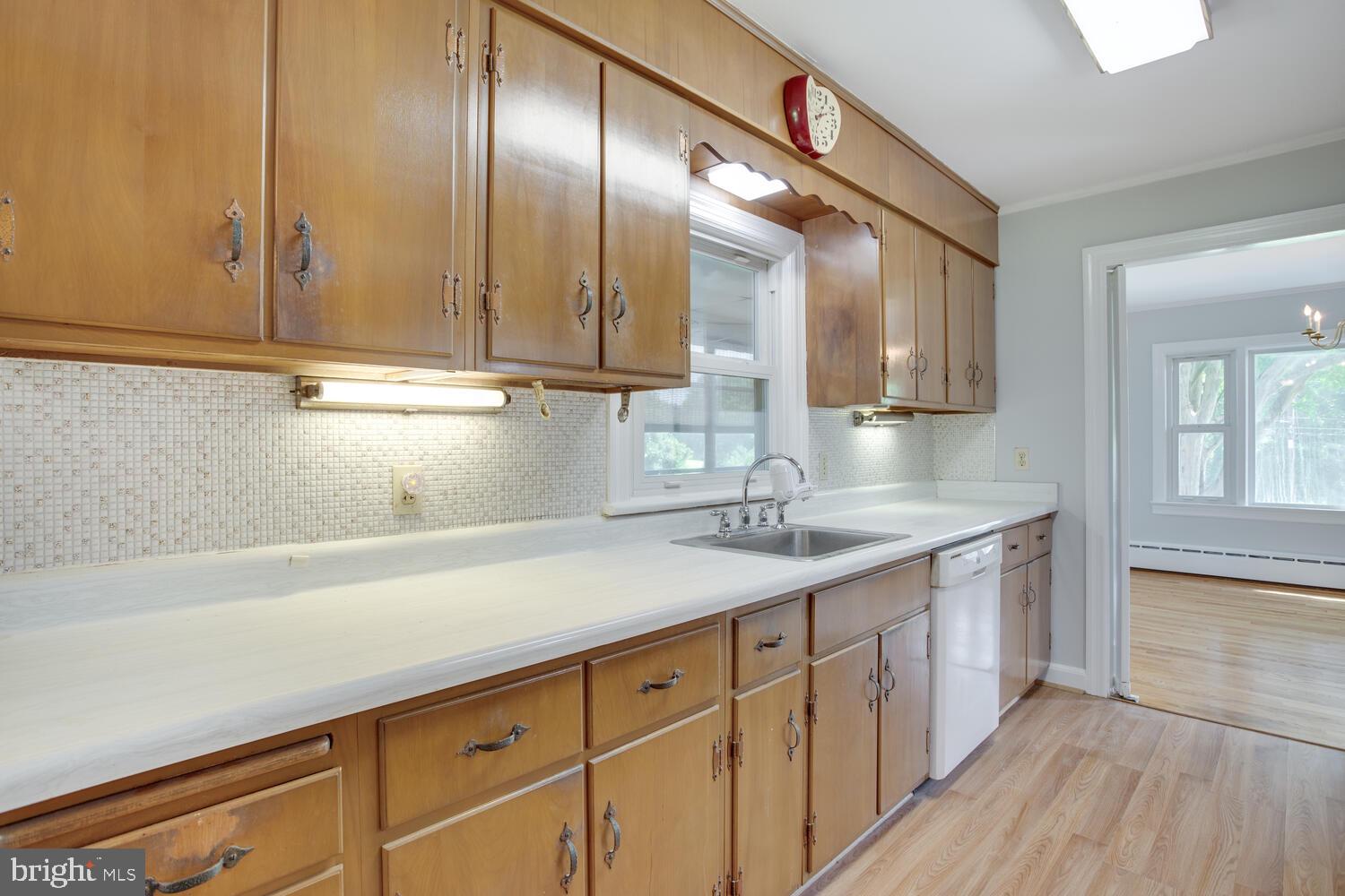 2510 Plum Point Road Huntingtown, MD 20639 - Photo 16 of 62 Kitchen w/ lots of bright light opens to DR