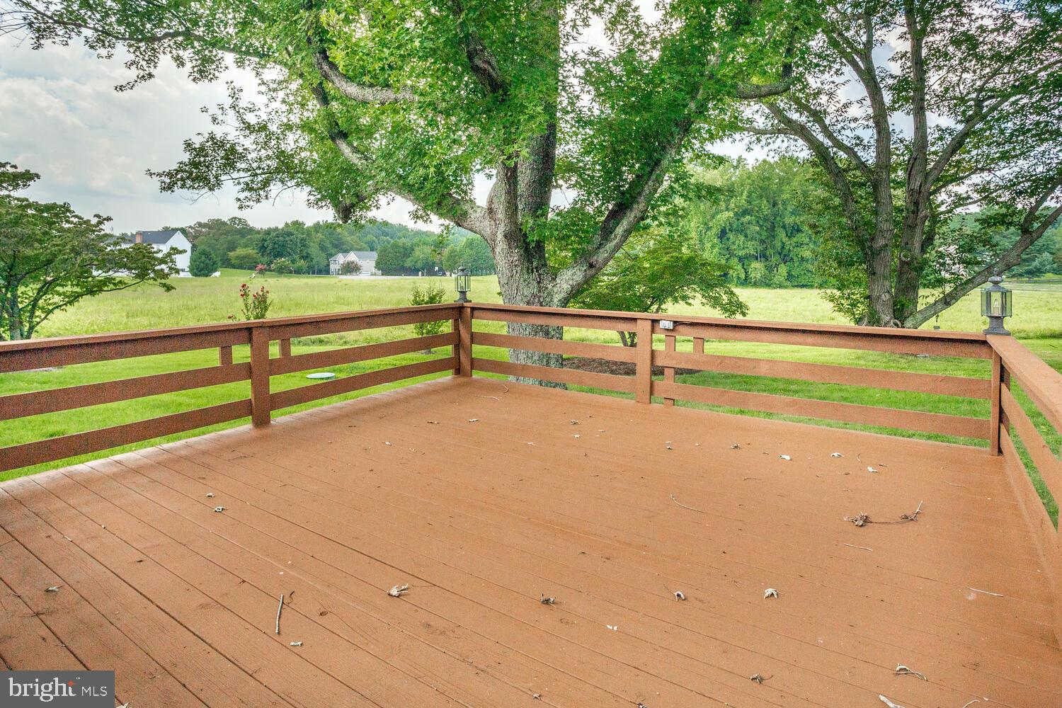 2510 Plum Point Road Huntingtown, MD 20639 - Photo 59 of 62 Freshly refinished deck overlooking open space