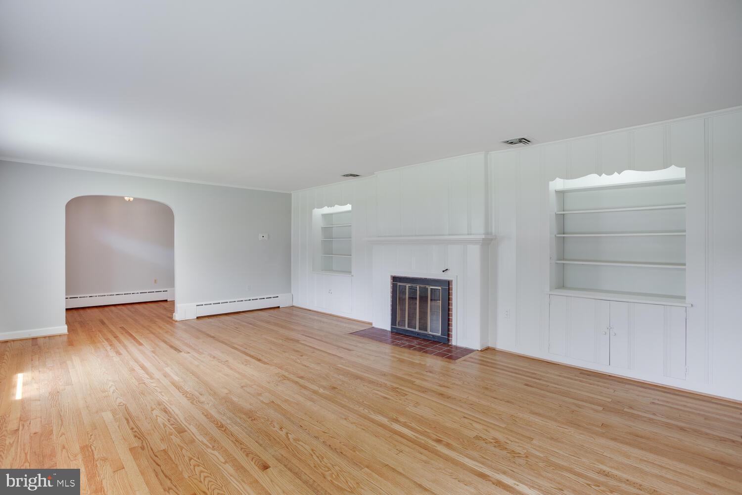 2510 Plum Point Road Huntingtown, MD 20639 - Photo 8 of 62 Living Room, built ins and wood burning FP