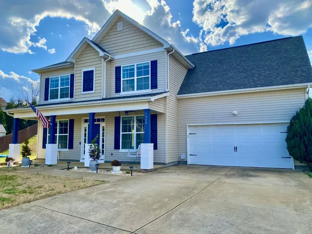 a view of a house with a garage