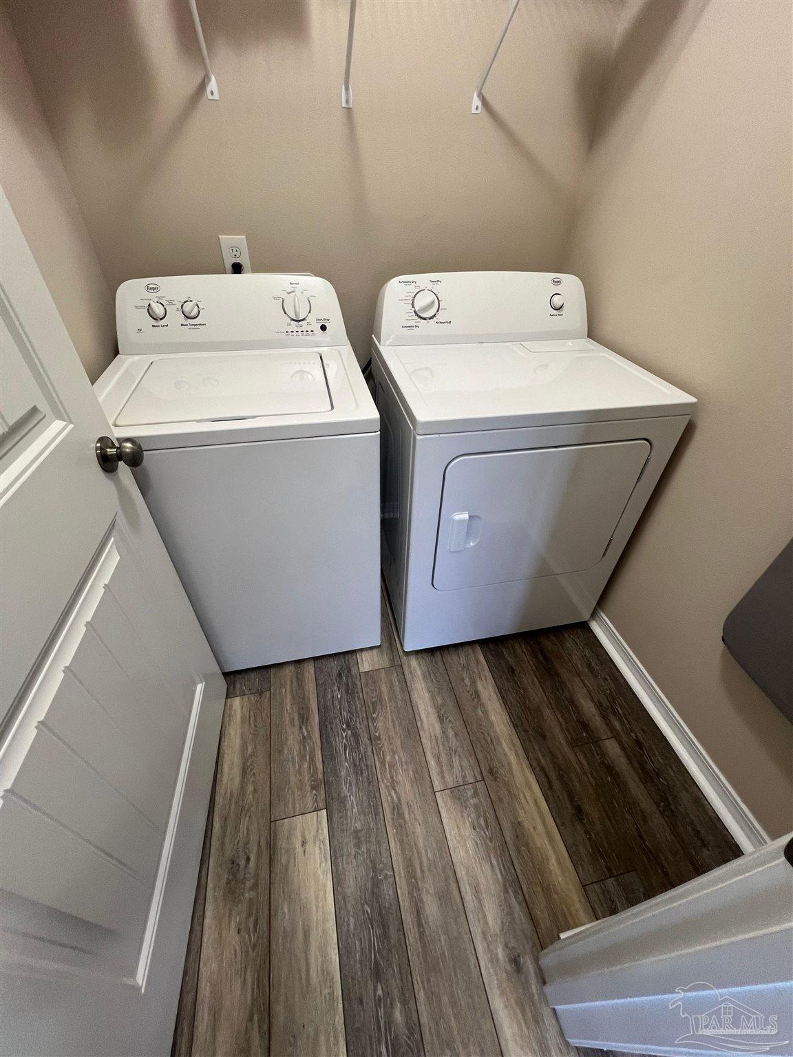 5798 Corkscrew Court Pace, FL 32571 - Photo 15 of 18 a utility room with dryer and washer