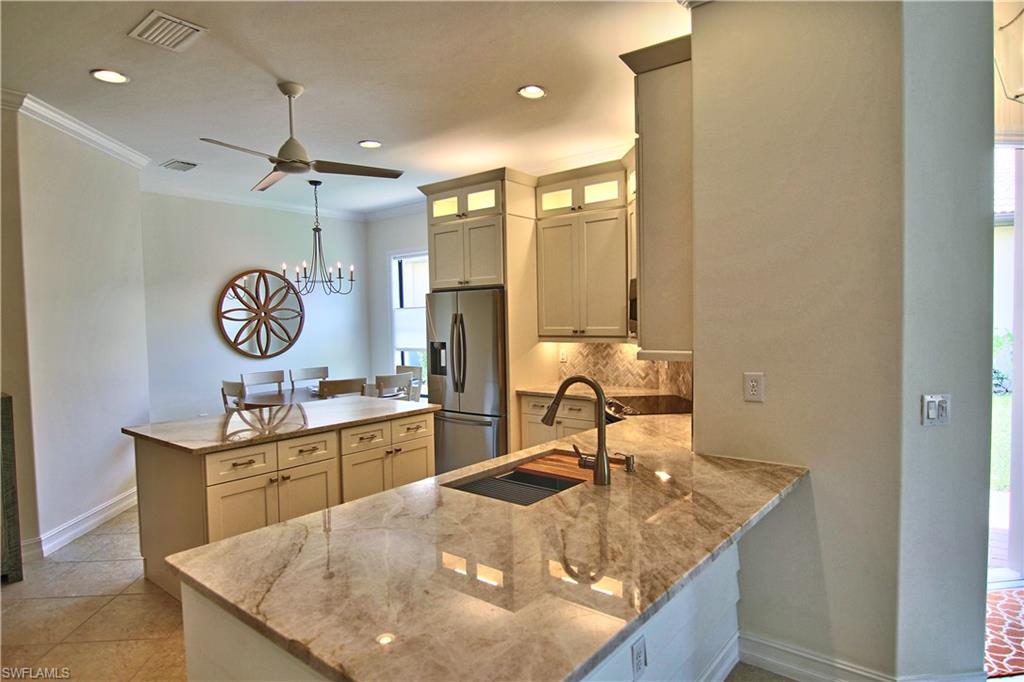 7421 Moorgate Point Way Naples, FL 34113 - Photo 8 of 32 Kitchen