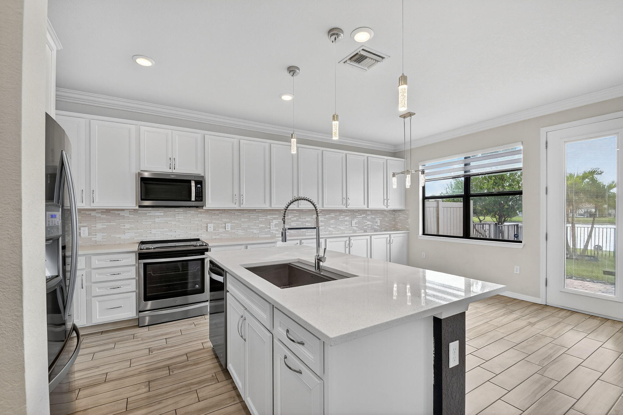 8301 Rearing Lane Lake Worth, FL 33467 - Photo 14 of 109 Kitchen/Dining View