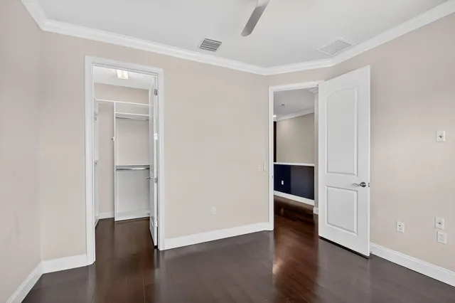 a view of house with outdoor space and swimming pool