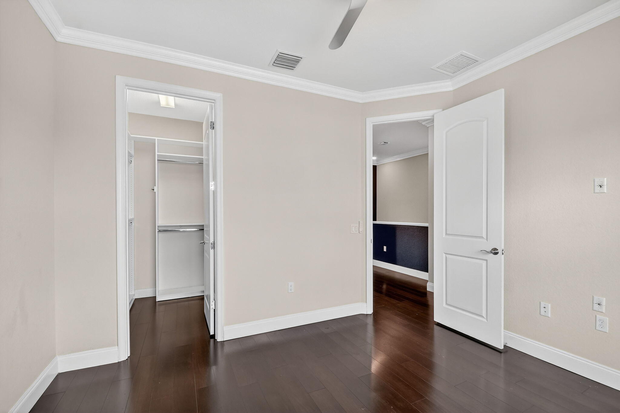 8301 Rearing Lane Lake Worth, FL 33467 - Photo 40 of 109 an empty room with wooden floor & closet and windows