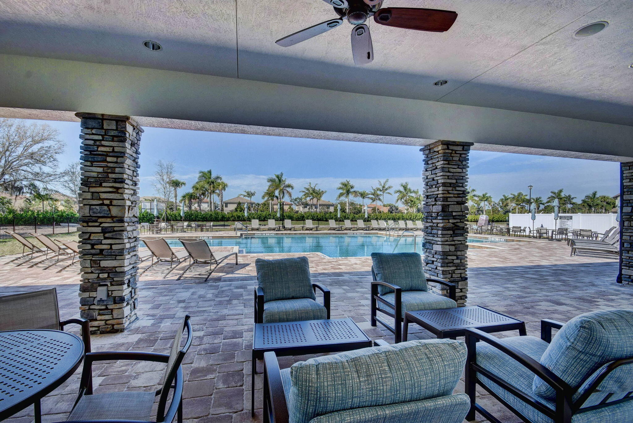 8301 Rearing Lane Lake Worth, FL 33467 - Photo 79 of 109 a living room with furniture and a floor to ceiling window