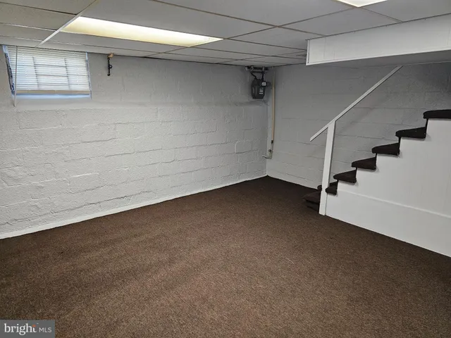 a view of a room with stairs