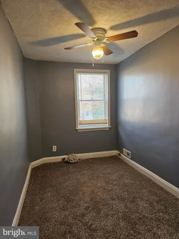 an empty room with window