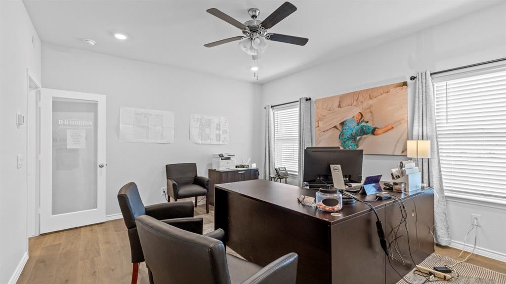 500 Range Road Caddo Mills, TX 75135 - Photo 14 of 35 Light-filled room featuring wood-finish flooring, two windows with blinds, recessed lighting, and a ceiling fan