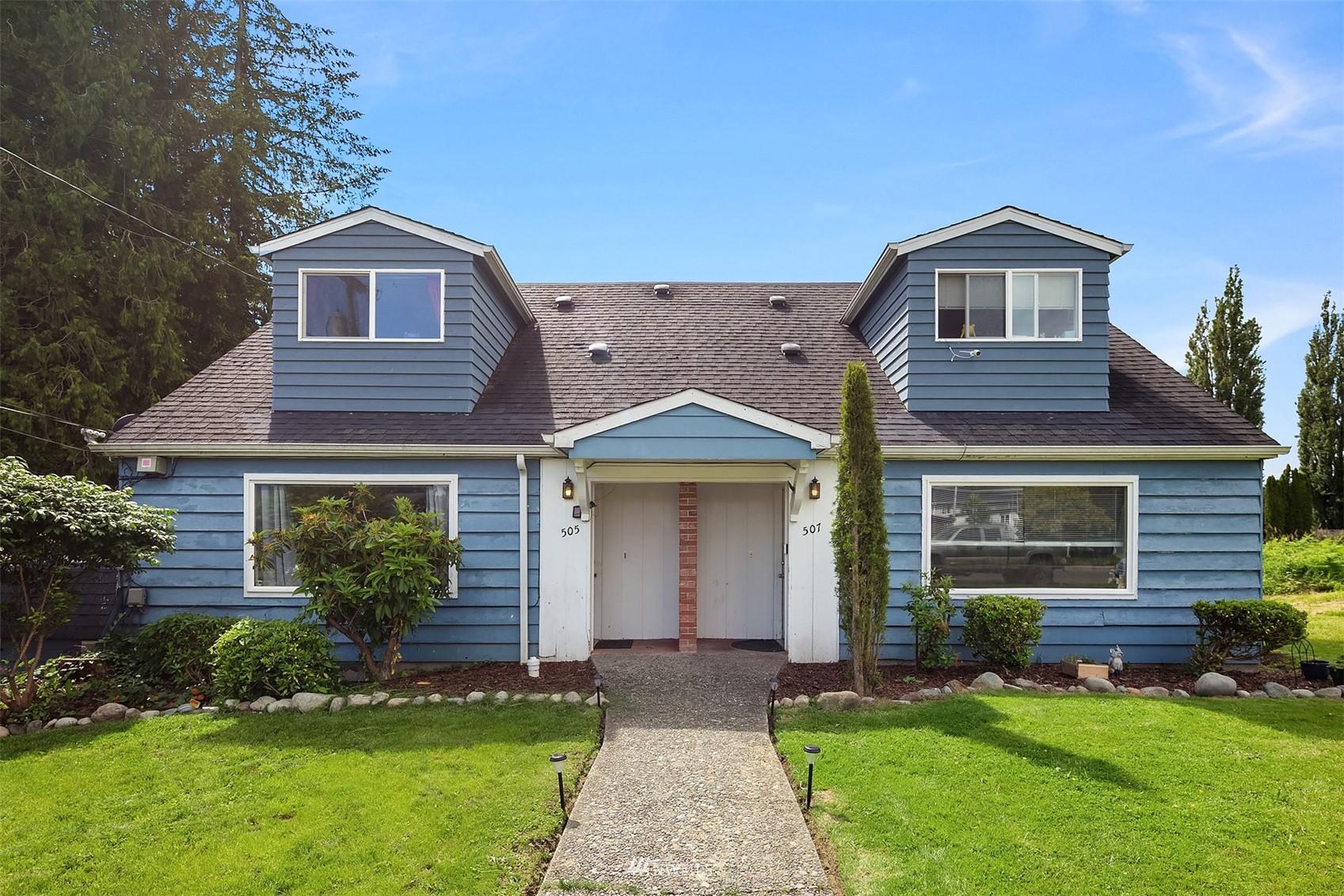 front view of house with a yard