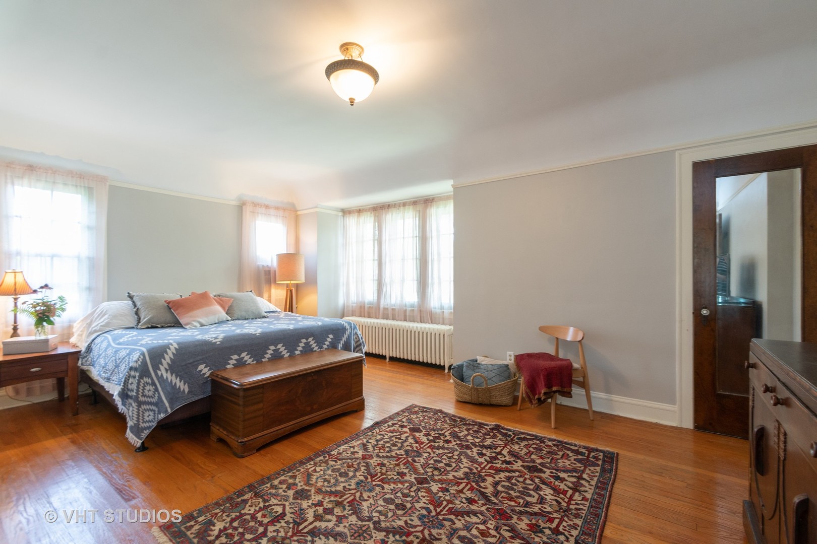 2321 Hawthorne Road Homewood, IL 60430 - Photo 6 of 11 a bedroom with a bed and wooden floor