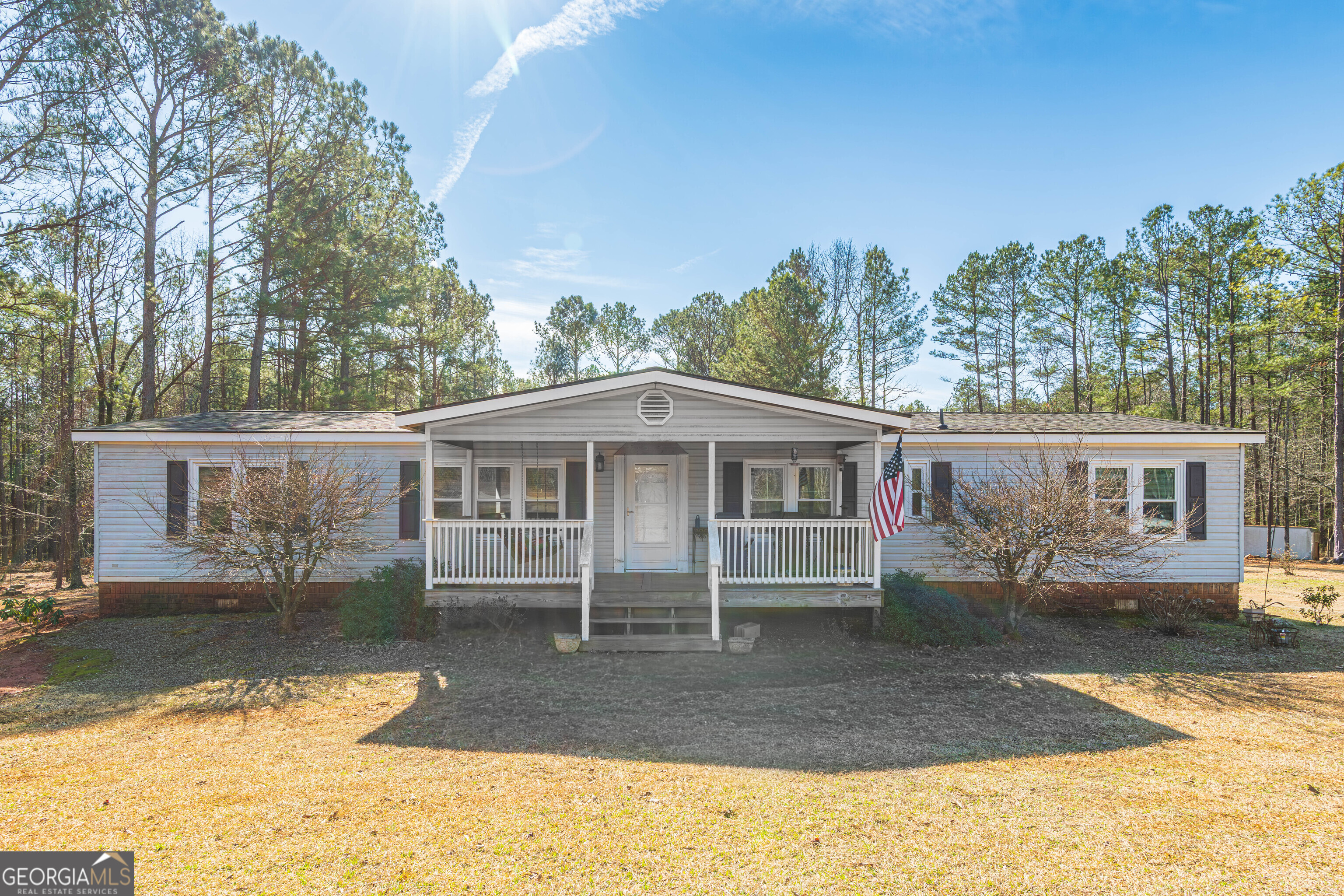 161 Cherokee Trail Forsyth, GA 31029 - Photo 22 of 32 a front view of a house with a yard