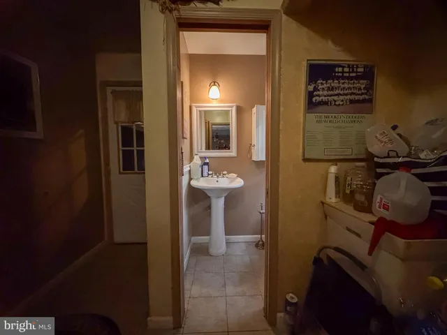 a storage room with furniture a washer and dryer