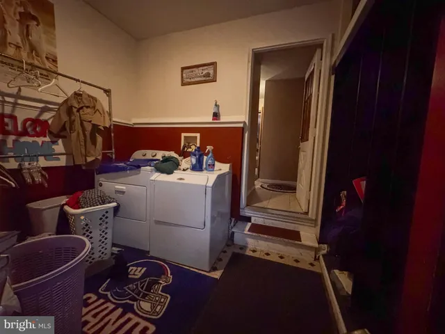 a room with gym equipment and a window