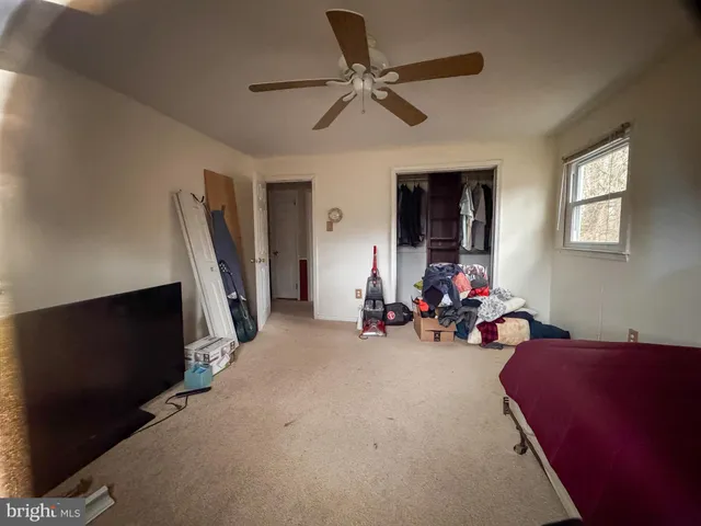 a view of livingroom with furniture and workspace