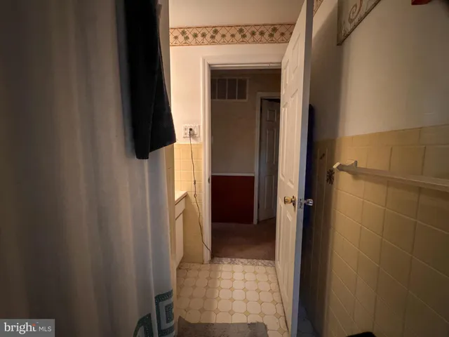 a bedroom with a bed and a closet