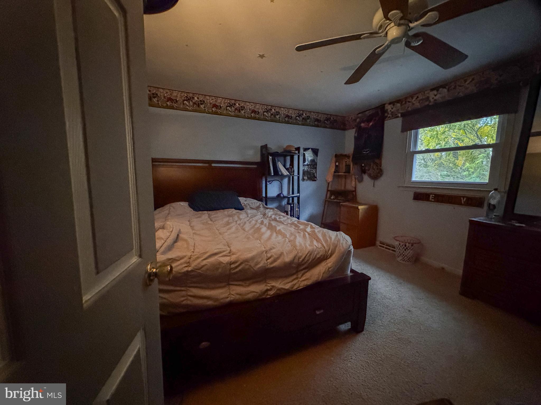 39 Georgia Trail Medford, NJ 08055 - Photo 44 of 49 a bed sitting in a bedroom next to a window